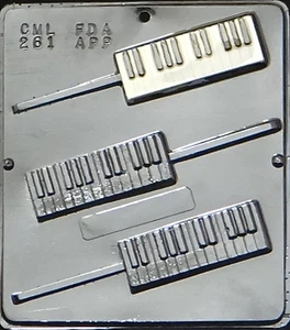 Teclado para piano piruleta chocolate molde para caramelo 261 NUEVO - Imagen 1 de 2