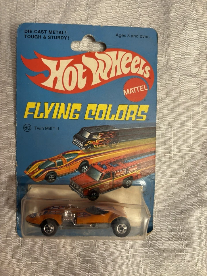B16 Mattel Hot Wheels Flying Colors Orange TwinMill II No. 60 in Blister Pack - Image 1 of 2