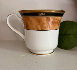 Taza de té con patas Bone China Cabot de Noritake 9785 diseño mármol dorado repuesto - Imagen 1 de 3