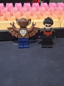 LEGO Nightwing Manbat Minifigure Set with Red Eyes and Chest Symbol 76011