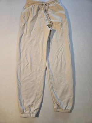 Pantalones deportivos H&M para niñas blanco roto talla XS Foto 1 de 4