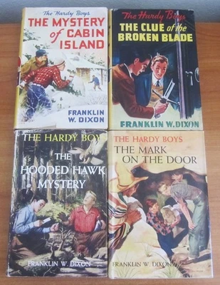 LOT OF 4 HARDY BOYS VINTAGE MYSTERY HC BOOKS WITH DUST JACKETS TAN COVERS - Image 1 of 4