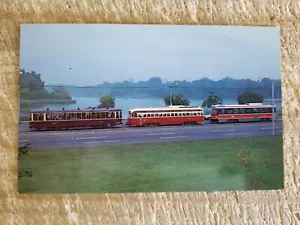 THREE GENERATIONS OF STREETCARS WESTBOUND ON QUEENSWAY AT HIGH PARK.VTG POST*P38 - Picture 1 of 2