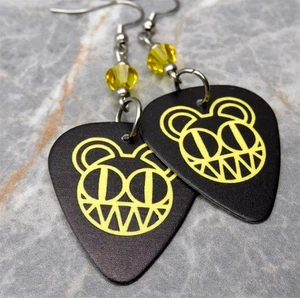 Orecchini Plettro Chitarra Nero Logo Radiohead con Cristalli Swarovski Gialli - Foto 1 di 5