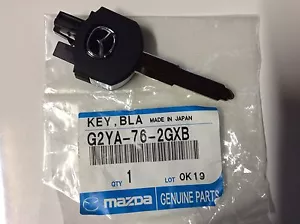 GENUINO NUEVO MAZDA CX-7 09/2006-2014 CONTROL REMOTO FLLIP LLAVE BLANCA - Imagen 1 de 4