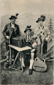 MUSICIAN GROUP ANTIQUE POSTCARD FUN PORTRAIT YOUNG MEN WITH INSTRUMENTS B6 - Picture 1 of 2