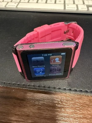 iPod Nano 6th Generation (released 2010), placed in a third-party “watch strap” - Image 1 of 4