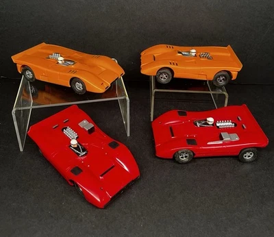 Juego de 2 coches Aurora AFX 1/32 1970 Ferrari 612 McLaren M12 naranja rojo L@@K Foto 1 de 4