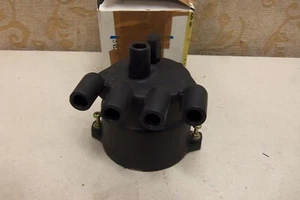 NOS GENUINE MAZDA FAMILIA 323 1985-90 4cylinder DISTRIBUTOR CAP # E505-18-V00 - Picture 1 of 6