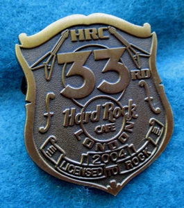 LONDRES 33º ANIVERSARIO BRONCE POLICÍA ESCUDO DE SEGURIDAD Hard Rock Café PIN LE - Imagen 1 de 1