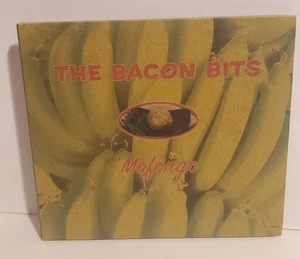 $1 THE BACON BITS MOGONGO CD ALBUM COMPACT DISC SLIPCASE 2006 - Imagen 1 de 2