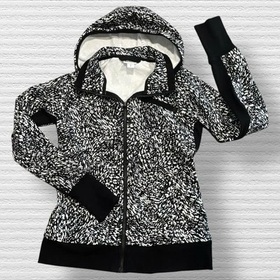Sudadera con Capucha Estampada Athleta Triumph Cremallera Completa Negra Blanca Tormenta de Vientos Talla Pequeña Foto 1 de 4