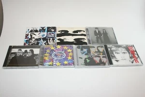 Seven U2 CDs-Joshua Tree, Zooropa, Pop, Boy, Achtung Baby & Songs of Experience - Imagen 1 de 7