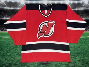 Camiseta New Jersey Devils CCM Multi-Firmada por Jugadores Talla Mediana Usada SIN CERTIFICADO DE AUTENTICIDAD - Imagen 1 de 12