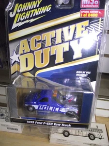 Johnny Lightning 1/64 MIJO 1999 Ford F-450 Tow Truck police NIB - Picture 1 of 1