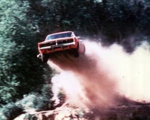 Dukes of Hazzard extraordinary 16x20 poster of General Lee flying off hillside - Picture 1 of 1