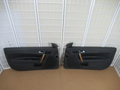 06-08 Volvo C70 Convertible BLACK & WOODGRAIN Power Left Right Door Panel SET - Image 1 of 4