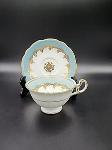 Taza de té y platillo vintage Foley "Ciprés" Avon #3087 Bone China England Aqua Gold - Imagen 1 de 17