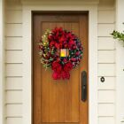 Frappe de porte de Noël festif avec couronne magnifiquement conçue