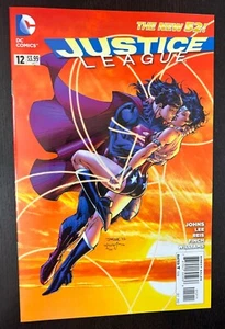 Liga de la Justicia #12 (DC Comics 2012) -- Jim Lee -- Wonder Woman Kiss -- Casi nuevo- - Imagen 1 de 2