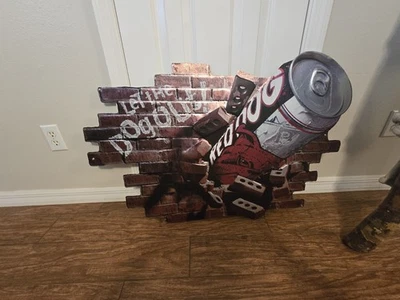 Letrero de metal de cerveza de hojalata Red Dog Let The Dogs Out Foto 1 de 4