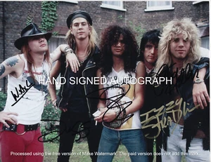 GUNS N' ROSES BAND TODOS LOS MIEMBROS AUTOGRAFIADOS 8 1/2 X 11 FOTO / CERTIFICADO DE AUTENTICIDAD - Imagen 1 de 2