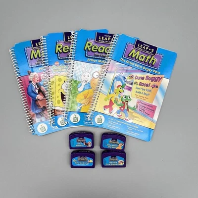 Lot of 4 LeapFrog: Leap 2 Cartridges & Books Grades 1-3 Music, Reading, Math - Image 1 of 4