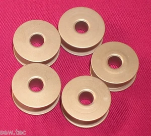 5 ALUMINIUM INDUSTRIAL SEWING MACHINE BOBBINS FITS BROTHER JUKI - Picture 1 of 2