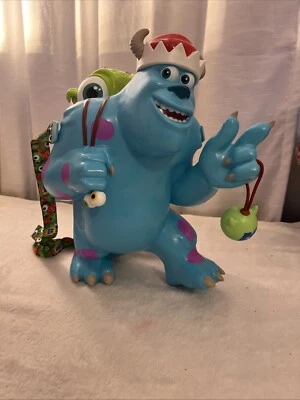 EN MANO 2024 Cubo Palomitas SANTA SULLY & MIKE WAZOWSKI Monstruos Parques Disney Foto 1 de 4