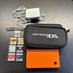 Nintendo DSi Orange Console Bundle 7 Games Case Charger Has Scratches Look c14 - Picture 1 of 15