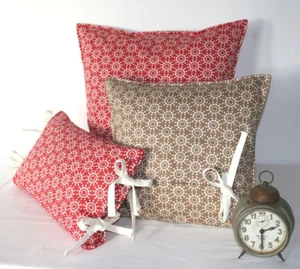 Kissen Kylie 27x43 40x40 50x50 Schleifen rot nuss braun Proflax - Bild 1 von 3