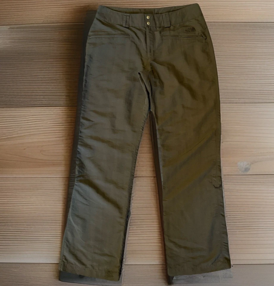 Pantalones THE NORTH FACE para mujer talla 8 gris oscuro ligeros bolsillos con cremallera senderismo usados en excelente estado Foto 1 de 4