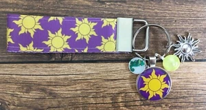Key Fob Chain Holder Strap Mini Rapunzel Tangled Sun Pascal Purple Charms RTS 3" - Picture 1 of 1