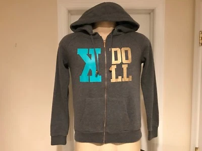 Chaqueta sudadera mediana Kim Kardashian Kollection para mujer con capucha y cremallera Foto 1 de 4