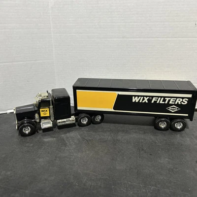 ERTL PETERBILT WIX FILTROS SEMIRREMOLQUE Y REMOLQUE JUEGO DE JUGUETES DE ACERO EN NEGRO Foto 1 de 4