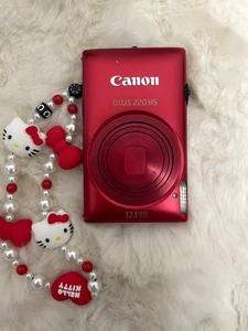 Canon IXUS220/ELPH300HS/IXY410F Red-DIGIC 4, 8fps Burst, Vibrant Red Camera - Picture 1 of 4