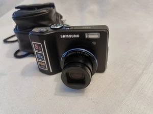 Samsung Digitalkamera - Model S850 - 8.1MP schwarz funktionstüchtig mit 1GB & Tasche Leder - Bild 1 von 13