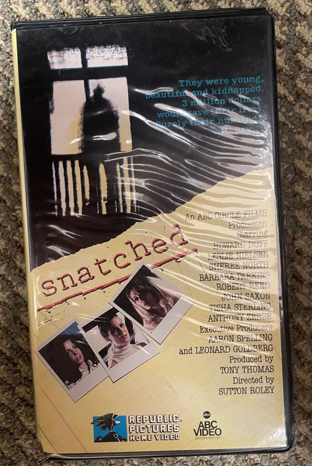 Snatched clamshell VHS  1973 TV movie Howard Duff, Leslie Nielsen, Sheree North - Image 1 of 1