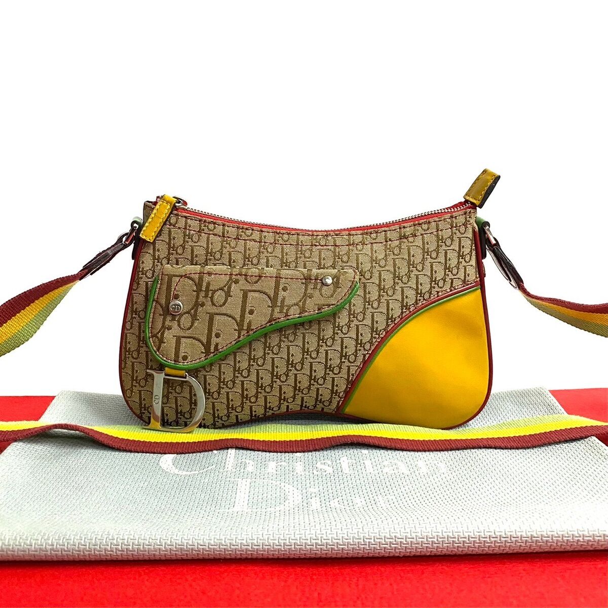 Preços baixos em Dior Rasta em Bolsas Femininas | eBay Preços baixos em Dior Rasta em Bolsas Femininas | eBay