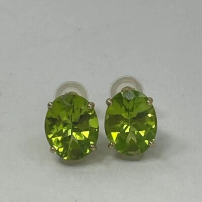 Natural Peridot Oval Gemstone Stud Earrings with 14kt Yellow Gold - Image 1 of 4