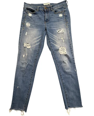 Pantalones de mezclilla Mudd para mujer talla 7 ajustados elásticos desgastados con tachuelas dobladillo crudo azul Foto 1 de 4