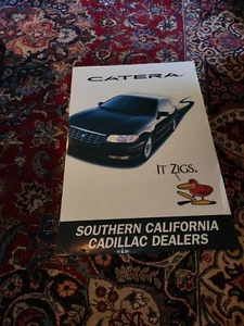 1997 Cadillac Catera "It Zigs" Dealer Poster  - Picture 1 of 11