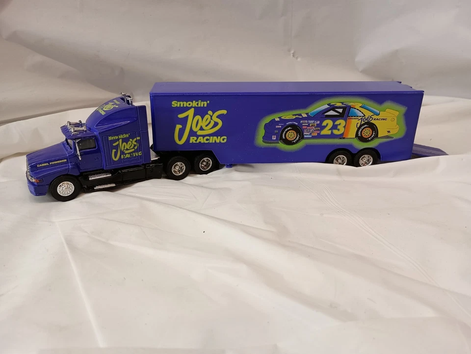Jimmy Spencer #23 "SMOKIN 🐪 JOE CAMEL HAULER" 1:64 Racing Champions Foto 1 de 4
