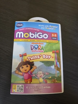 New/Sealed Vtech MobiGo Dora the Explorer: Twins' Day 6 Learning Games Free Ship - Image 1 of 4