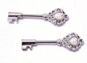 Nipple-PAIR-Keys w/Opal White 14 Gauge 1/2" Steel Barbells - Picture 1 of 3