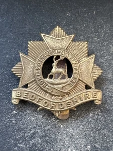 Bedfordshire Regiment, 1916 Economy War Issue British Army Cap Badge. - Picture 1 of 4