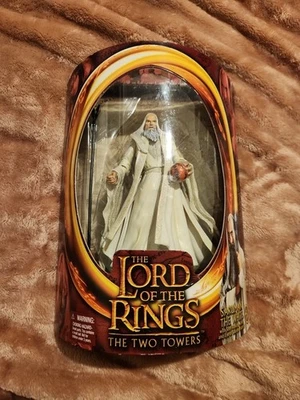  Figura de acción El Señor de los Anillos-La Comunidad del Anillo SARUMAN Toy Biz Foto 1 de 4