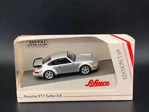 Schuco Porsche 911 (964) Turbo 3.6 plateado 1/64 - Imagen 1 de 1