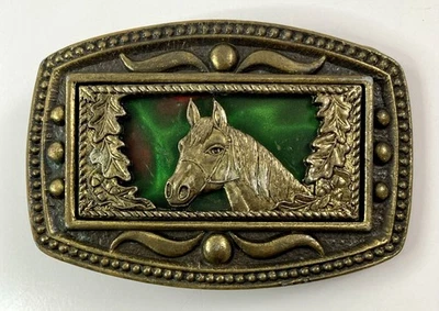 Hebilla de cinturón de latón holográfica verde fondo caballo CII Nueva York vintage años 70 Foto 1 de 4