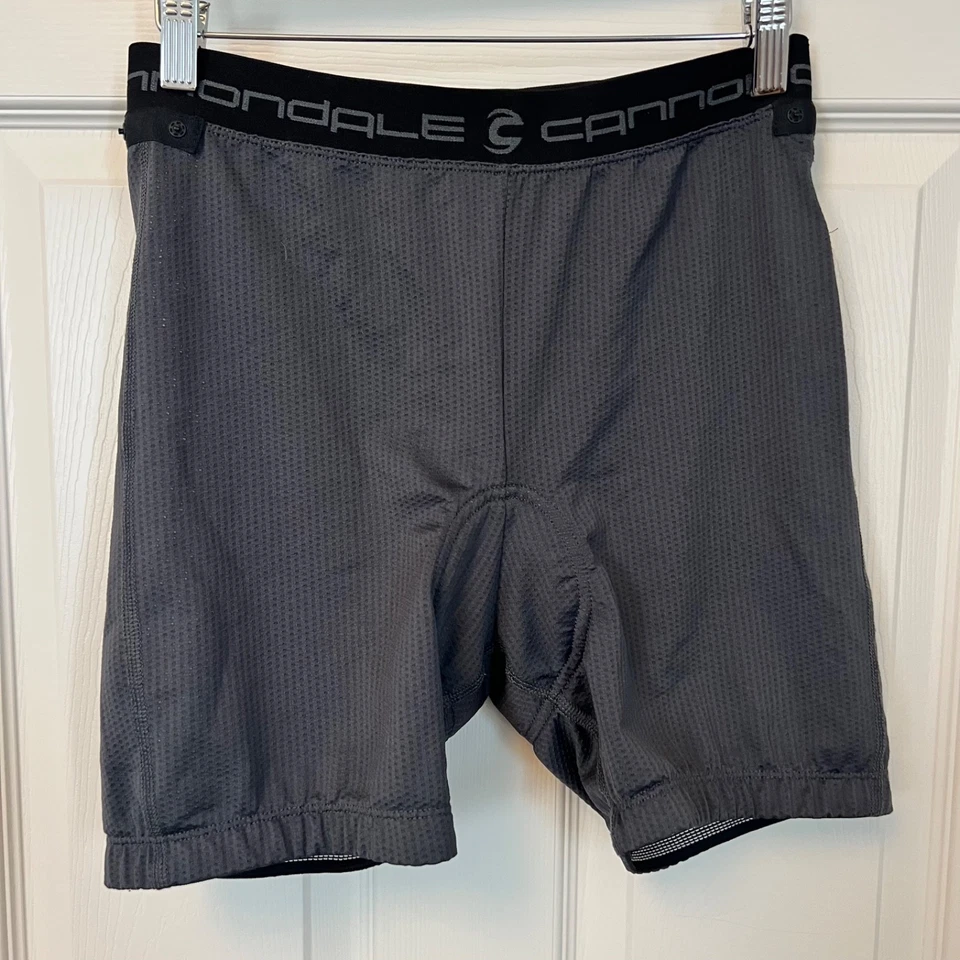 Pantalones cortos de ciclismo Cannondale de compresión acolchados grises para mujer talla M Foto 1 de 4